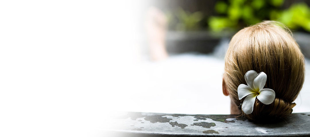 woman in spa facing away